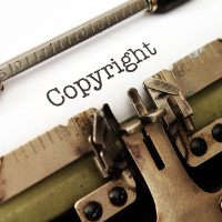 the word "copyright" written on a typewriter